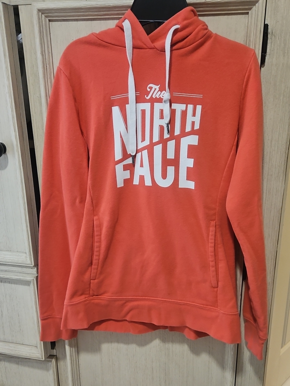 The North Face Coral-Orange Hoodie with White Logo